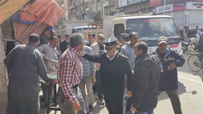 تحرير 25محضر اشغال بالطريق العام و رفع322 حالة بشوارع حي ثان المحلة 