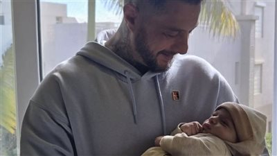 أحمد الفيشاوي يثير التساؤلات بصورته مع طفل رضيع: حبيب جدو