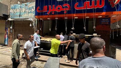 رفع 600 حالة تعدي علي الطريق العام والتحفظ على مركبات توك توك باللبيني والمجزر والمنشية بالهرم
