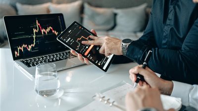 العملات الرقمية - روبوت التداول الشبكي والاستفادة من تقلبات الأسعار